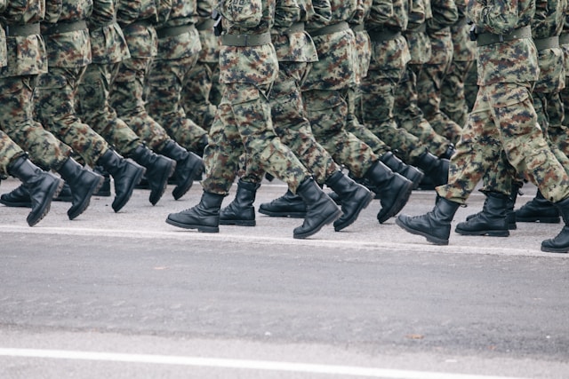 soliders marching, photographed from the neck down